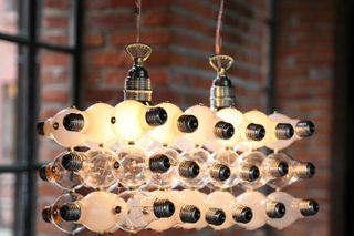 Illustration for article titled Crazy Sexy Cool Lamps, 100% Made From Bulbs